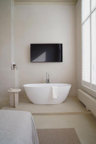 Hotel âmeにあるテレビまたはエンターテインメントセンター
