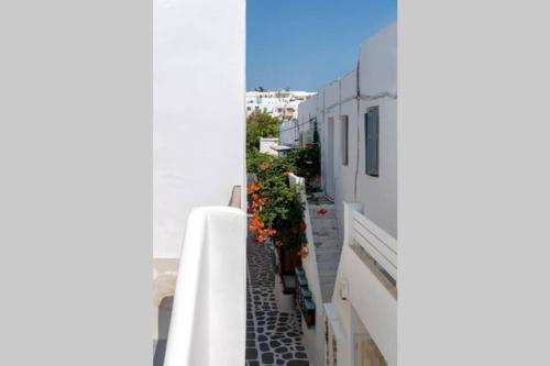 a view from a balcony of a white building at Soso's House in Naousa