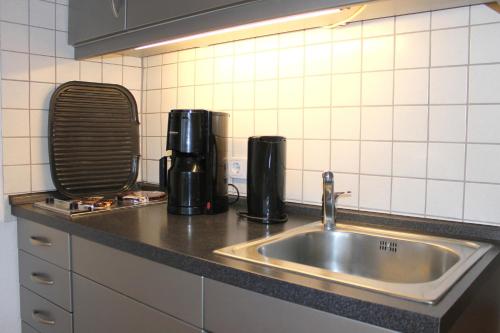 Ett kök eller pentry på "Parkresidenz - Whg 13 c" preisgünstige Wohnung in ruhiger Ortslage