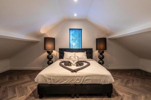 Voodi või voodid majutusasutuse Luxexcellent super suite toas