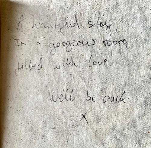 a handwritten handwriting on a piece of paper at Luxurious, Fabulous, Fun, Contemporary Suite in Retreat Centre in Salisbury