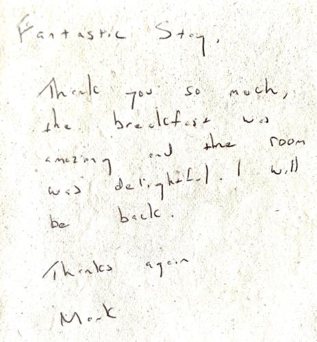 a handwritten letter with handwriting on a white paper at Luxurious, Fabulous, Fun, Contemporary Suite in Retreat Centre in Salisbury