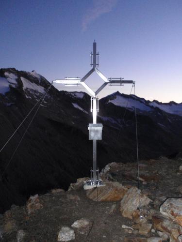 a cross on the top of a mountain at Appartement Sonneck in Lappago