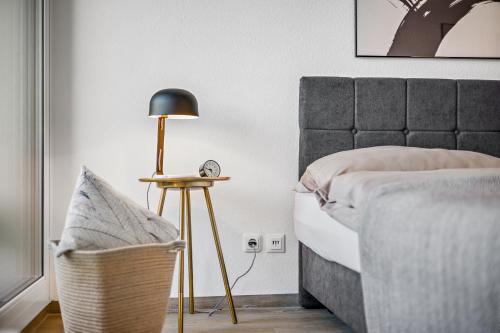 Postel nebo postele na pokoji v ubytování Studio Augsburg-Altstadt