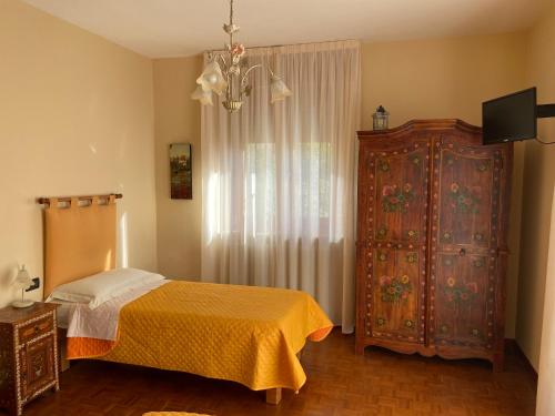 Postel nebo postele na pokoji v ubytování La Via del Sole