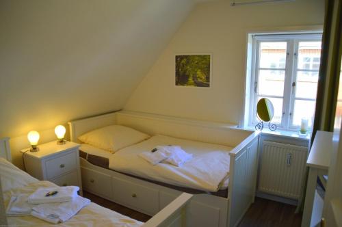 Posteľ alebo postele v izbe v ubytovaní Üüs letj Hüs