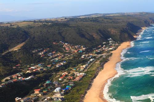 an aerial view of a beach next to the ocean at Beach House 11A in Groot Brak Rivier
