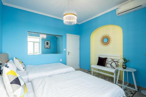 Katil atau katil-katil dalam bilik di Sanya Wen Xin Hai Jing Apartement