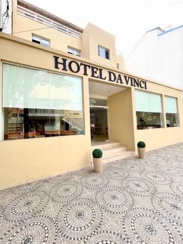 a hotel building with a sign that reads hotel drawing at Hotel Davinci in San Bernardo