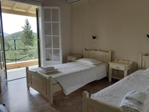 Postel nebo postele na pokoji v ubytování RoyalRose