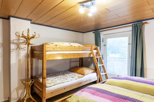 Postel nebo postele na pokoji v ubytování Haus Ruepp