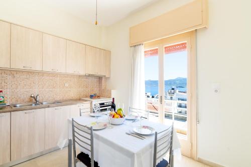 Kuchyň nebo kuchyňský kout v ubytování Aloe Apartments