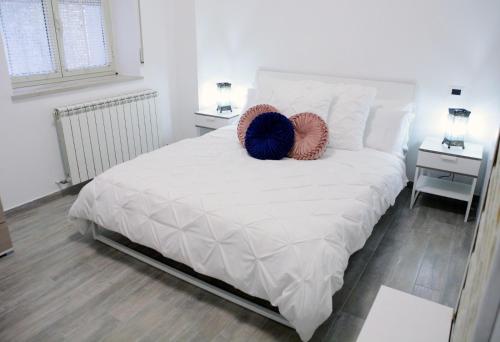 Katil atau katil-katil dalam bilik di Emerella Luxury Suites-Siderno Lungomare