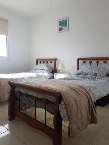 Postel nebo postele na pokoji v ubytování Armstrong Apartment
