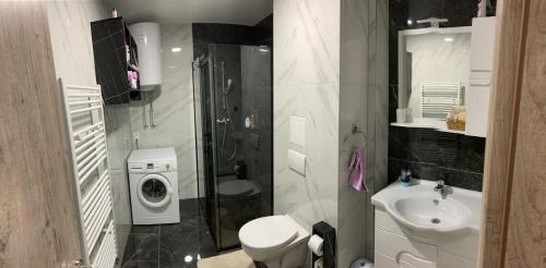 Et badeværelse på Apartman 