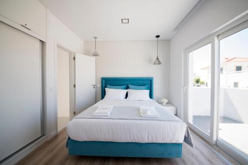 Katil atau katil-katil dalam bilik di Casa Lusitana da Praia & Casa Lusitana Mare Alta