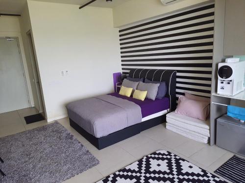 Кровать или кровати в номере Mufasa Suites at Tamarind Suites with Wifi Netflix Cuckoo Fridge