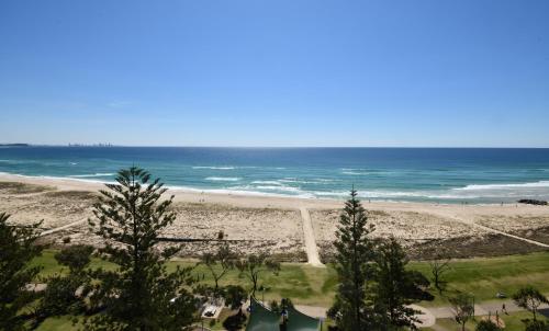 a view of a beach and the ocean at X Kirra Apartments in Gold Coast