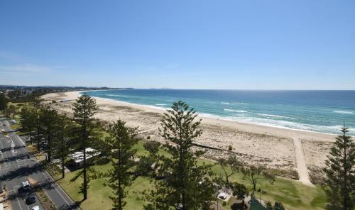 a view of a beach and the ocean at X Kirra Apartments in Gold Coast