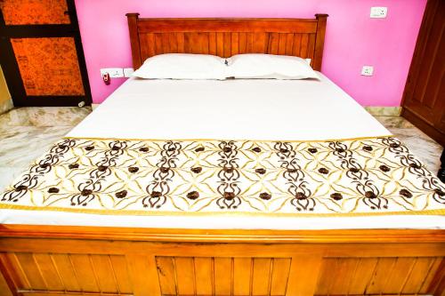 Ένα ή περισσότερα κρεβάτια σε δωμάτιο στο 4BHK Veda Villa - Near Heritage Town
