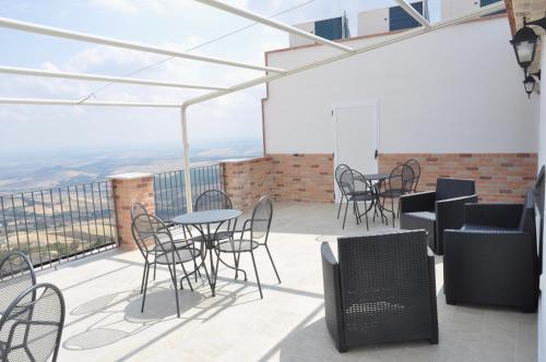 A balcony or terrace at RELAIS SAN MARCO LUXURY GUEST HOUSE