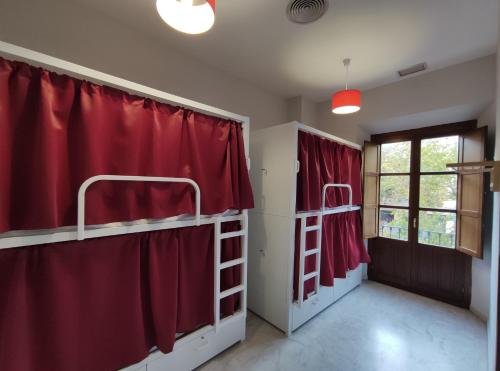 Posteľ alebo postele v izbe v ubytovaní New Samay Hostel