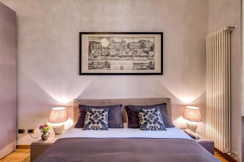 Un ou plusieurs lits dans un hébergement de l'établissement Palazzo Marescalchi Belli, vicino Piazza di Spagna
