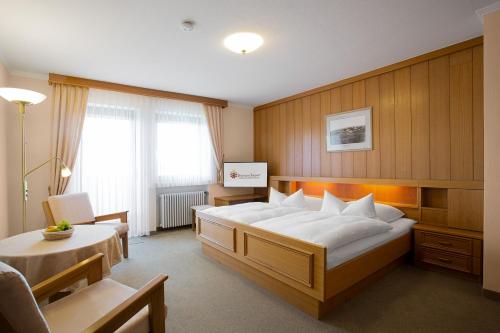 Postel nebo postele na pokoji v ubytování Gästehaus Prinzregent Luitpold