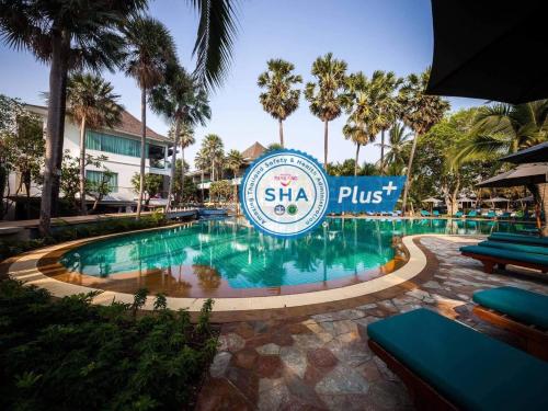 a swimming pool at the silla plus resort at Bann Pantai Resort in Cha Am