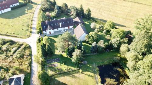 an aerial view of a large house in a field at Ubytování U MAXÍKA in Suchdol nad Lužnicí