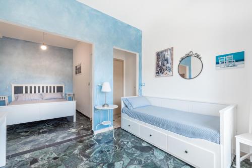A bed or beds in a room at Affittacamere la Tortuga