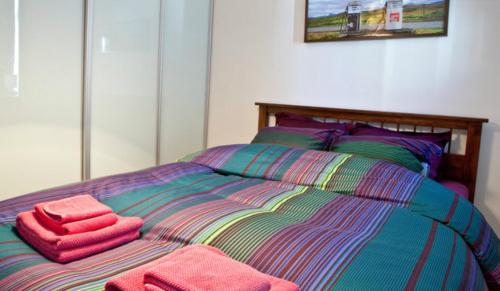 Postel nebo postele na pokoji v ubytování City Center Luxury Apartment
