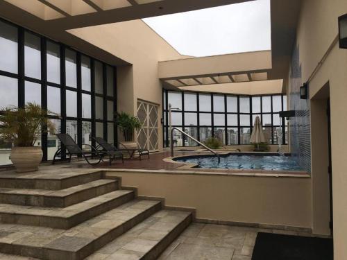 Piscine de l'établissement Flat Alameda Lorena - Prédio Ninety - Jardim Paulista ou située à proximité