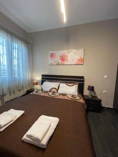 Ένα ή περισσότερα κρεβάτια σε δωμάτιο στο Efis guest house near Nafpaktos-Fully Equipped Home