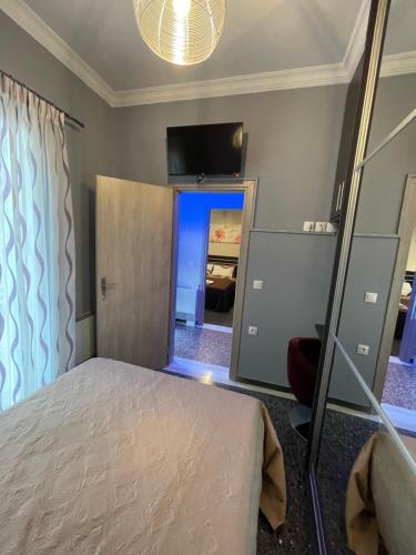 Ένα ή περισσότερα κρεβάτια σε δωμάτιο στο Efis guest house near Nafpaktos-Fully Equipped Home