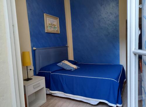 מיטה או מיטות בחדר ב-Hotel Tourist House - corner Santa Maria Novella Square - Florence