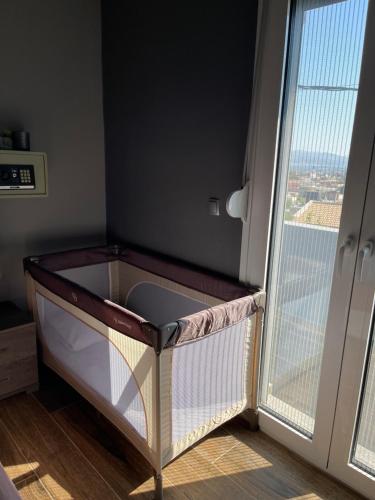 a bath tub sitting next to a large window at House of Sunset - Tranquility - View - Relaxation in Sívas