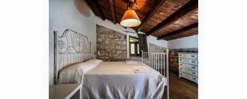 Postel nebo postele na pokoji v ubytování B&B Etico La Casa di Toti
