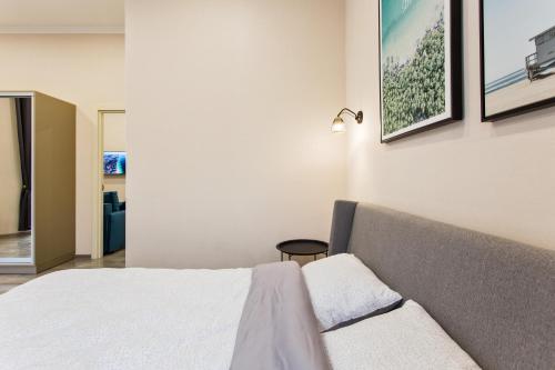 Ένα ή περισσότερα κρεβάτια σε δωμάτιο στο Havana ApartHotel