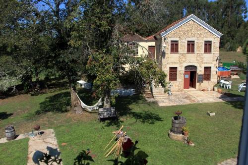 an aerial view of a house with a yard at Albergue e AL O Brasão Valença in Valença