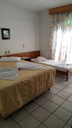 Katil atau katil-katil dalam bilik di HOTEL VISUAL