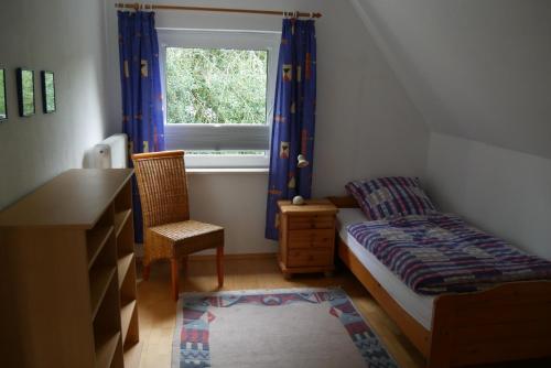 Giường trong phòng chung tại Ferienwohnung Auszeit