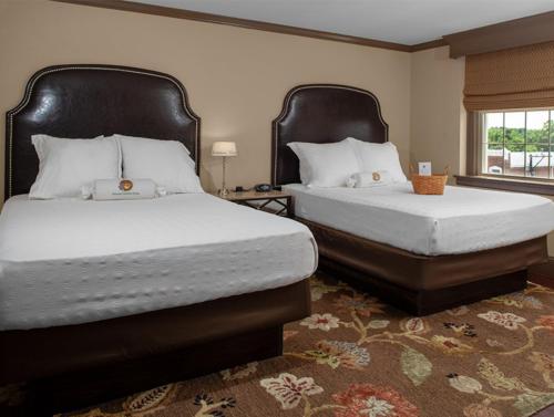 Tempat tidur dalam kamar di The Bolling Wilson Hotel, Ascend Hotel Collection