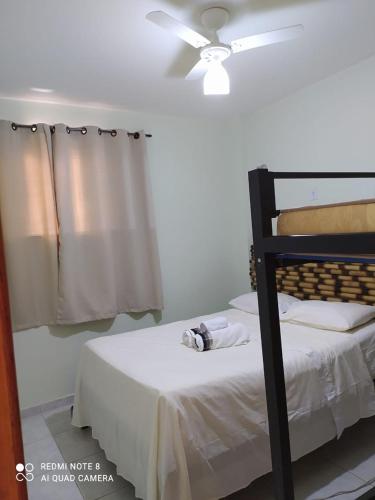 Postel nebo postele na pokoji v ubytování Paradise Hostel e Flats