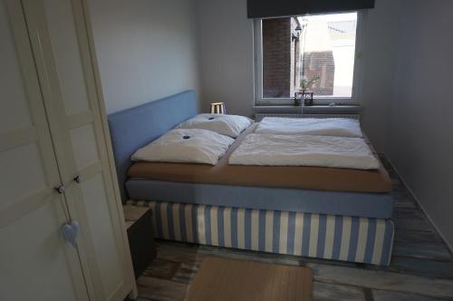 מיטה או מיטות בחדר ב-Carpe Diem IV 1324