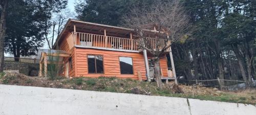 a house sitting on top of a hill at Bona Vista in Puerto Bertrand