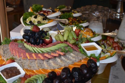 a large platter of food on a table at Best Western Plus Grand Multan in Multan