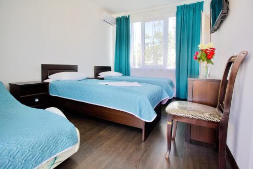 Un pat sau paturi într-o cameră la Family Resort Bambora
