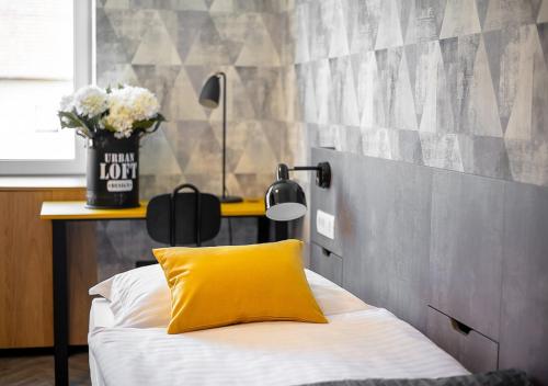Letto o letti in una camera di Urban Ring Hotel