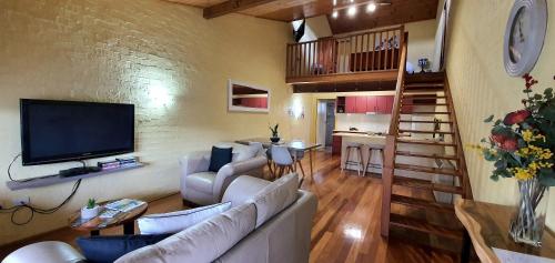 Televisyen dan/atau pusat hiburan di Great Escape Lofts